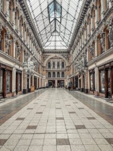 Interior of old historic building with ornamental walls and glass ceiling