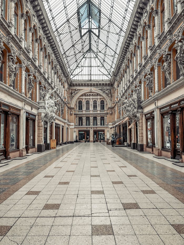 Interior of old historic building with ornamental walls and glass ceiling